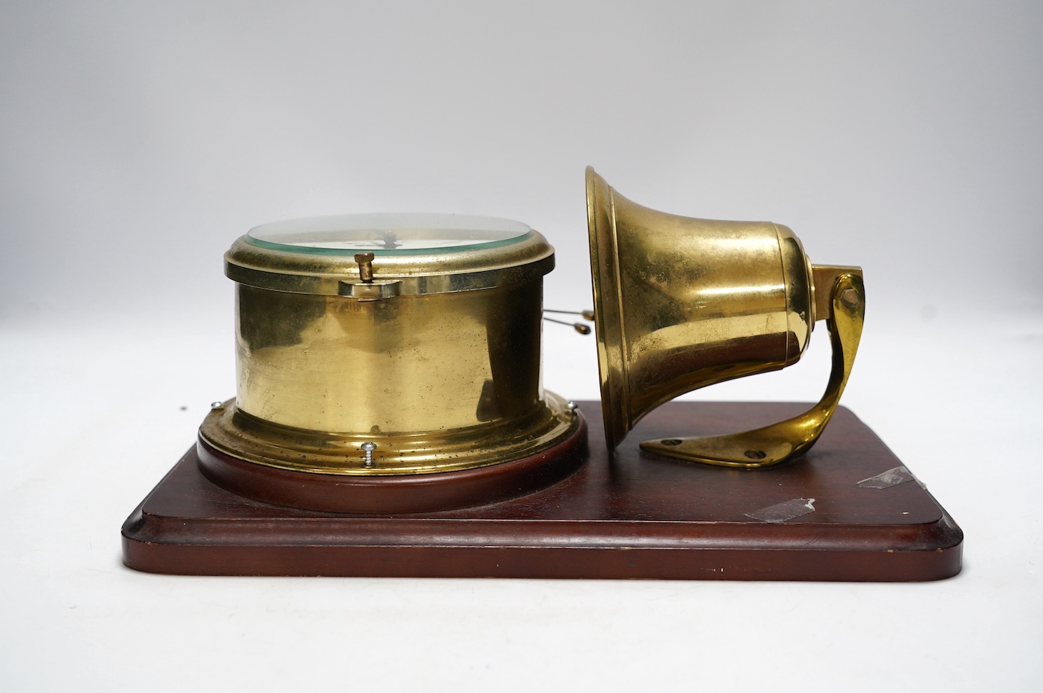 A mounted Schatz Royal Mariner brass clock, 21cm wide, 34cm high. Condition - untested for time keeping